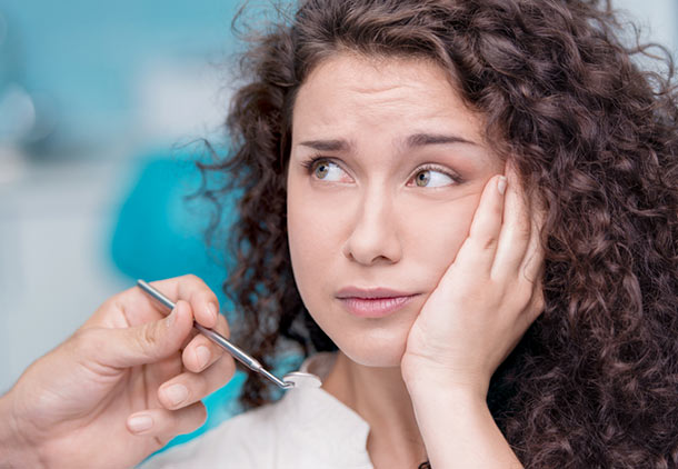 علائم عفونت دندان عقل نيمه نهفته چيست ؟