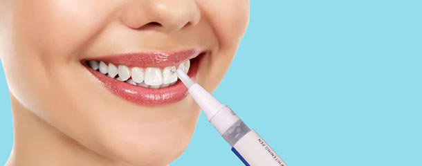 قلم سفید کننده دندان برای درمان خال های سیاه و قهوه ای دندان