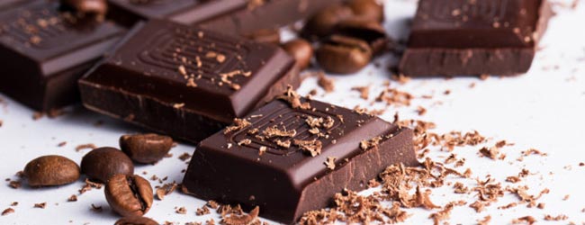 مواد غذایی انرژی زا برای بدنسازی : شکلات تلخ بهترین تنقلات انرژی زا برای بدنسازان